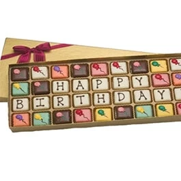 Фото Шоколадные конфеты с буквами и буквы из шоколада.
