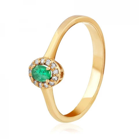 Фото Золотое кольцо с изумрудом и бриллиантами 