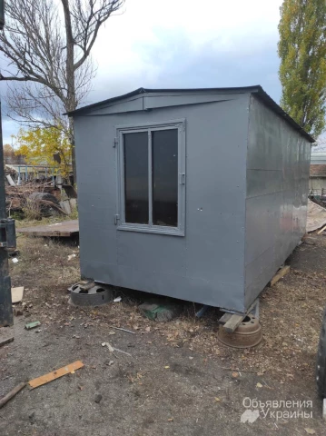 Фото Вагончик кунг бытовка утепленный c окнами, внутри стеллажи и  буржуйка